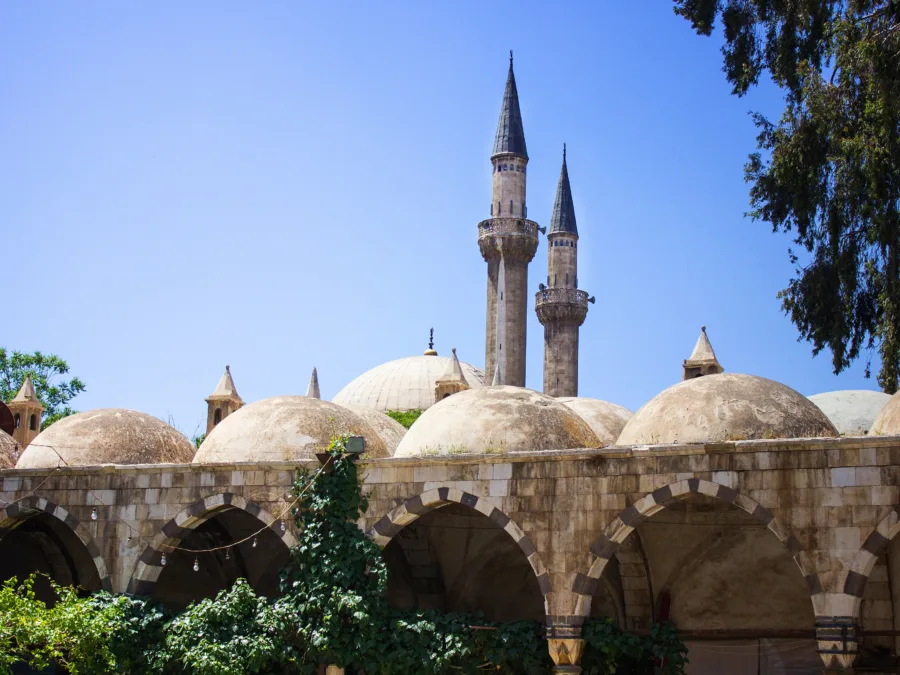 The lead domes and pencil minarets of the Takiyya al-Sulaimaniyya in Damascus, built to plans by Sinan