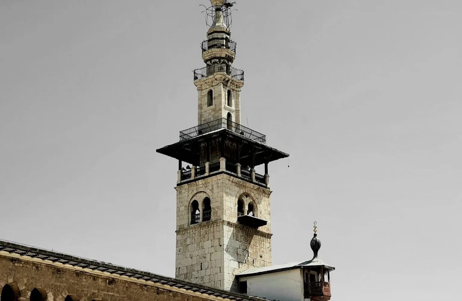 The Minaret of the Bride rising above the arcaded courtyard of the Umayyad Mosque