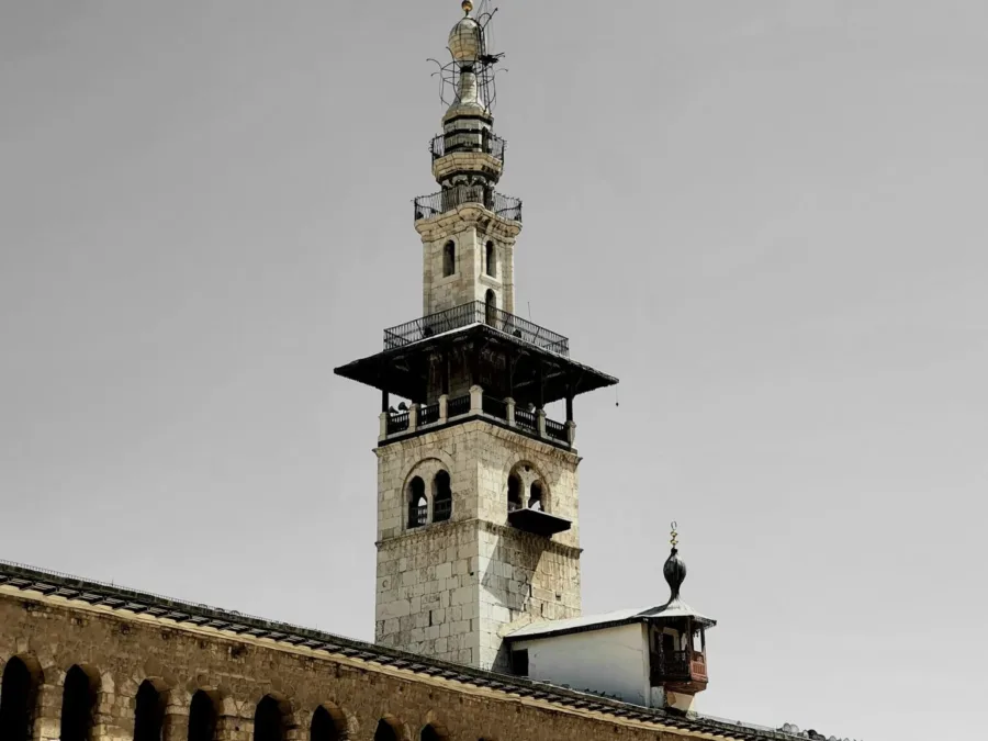 The Minaret of the Bride rising above the arcaded courtyard of the Umayyad Mosque